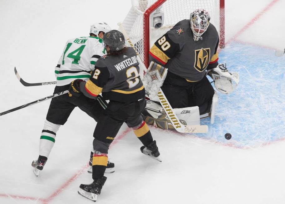 Dallas Stars' Jamie Benn (14) is stopped by Vegas Golden Knights goalie Robin Lehner (90) asGol ...