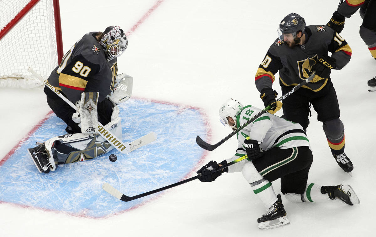 Dallas Stars' Blake Comeau (15) is stopped by Vegas Golden Knights goalie Robin Lehner (90) as ...