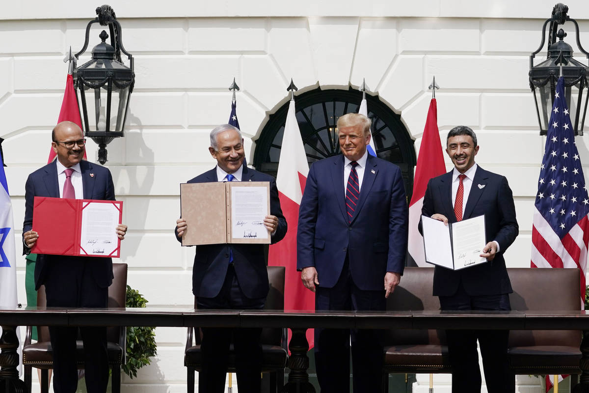 President Donald Trump, center, with from left, Bahrain Foreign Minister Khalid bin Ahmed Al Kh ...