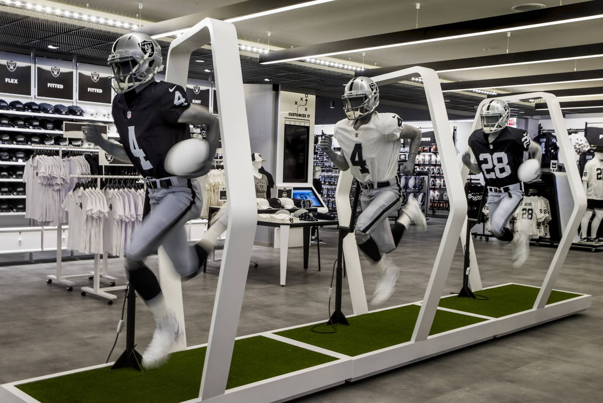 A robotic trio of runners on display within The Raider Image official team store inside of Alle ...