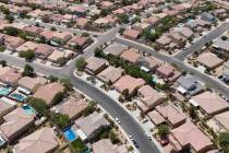 An aerial view of housing near Night Owl Bluff Avenue and West Gentle Brook Street in North Las ...