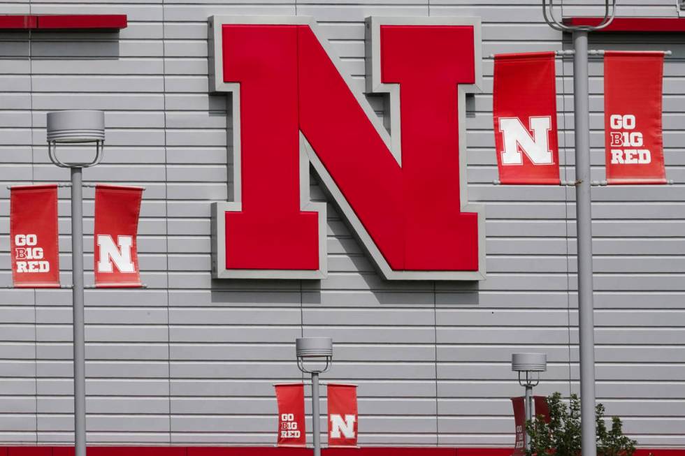 The Nebraska logo and flags incorporating the Big Ten logo are seen outside the Devaney sports ...