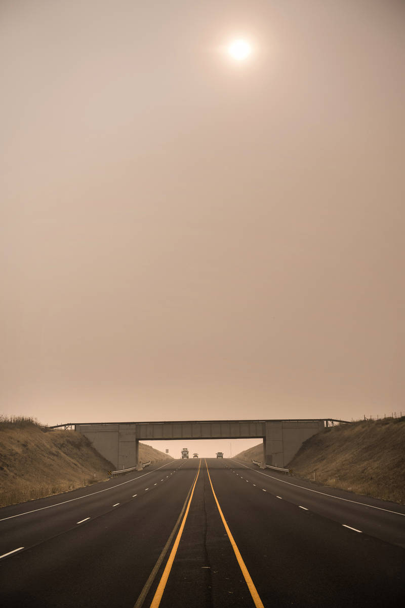 Traffic moves through the wildfire smoke along Oregon 11 on Wednesday afternoon, Sept. 16, 2020 ...