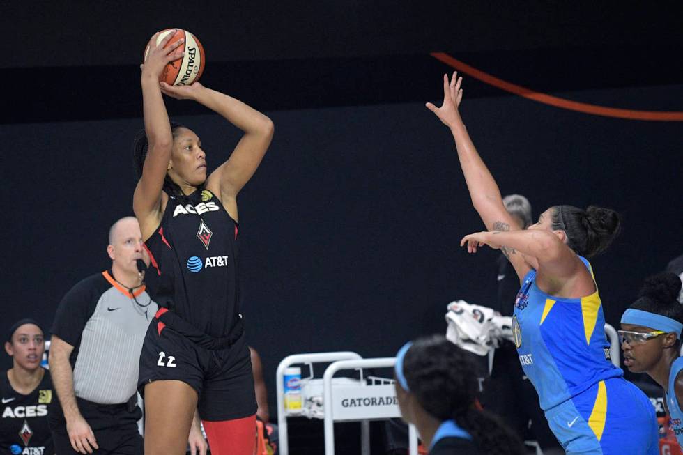 Las Vegas Aces center A'ja Wilson (22) goes up for a shot in front of Chicago Sky center Stefan ...