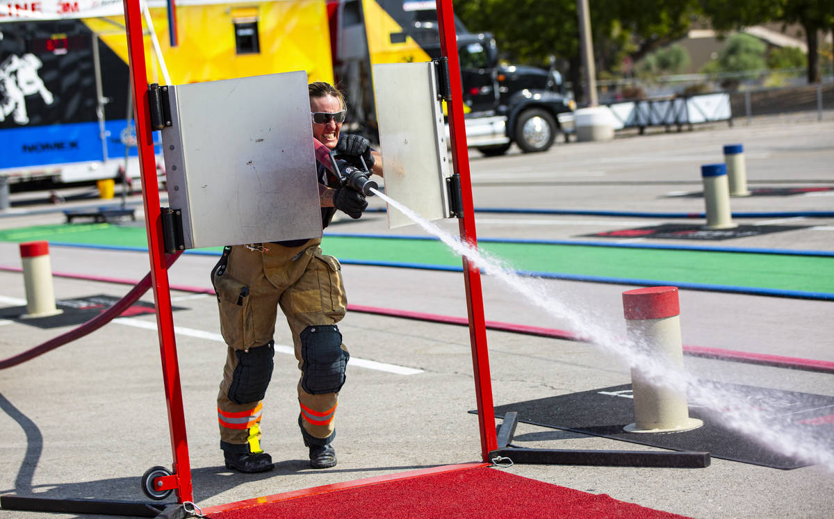 Las Vegas firefighter Jacqueline Palmer, former world champion, participates in a run-through o ...