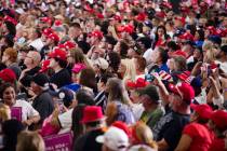 The crowd listens to President Donald Trump speak at a campaign rally at Xtreme Manufacturing i ...