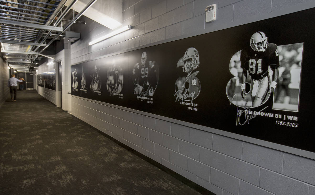 Las Vegas Raiders players will pass a team hall of fame wall on the way to and from their locke ...