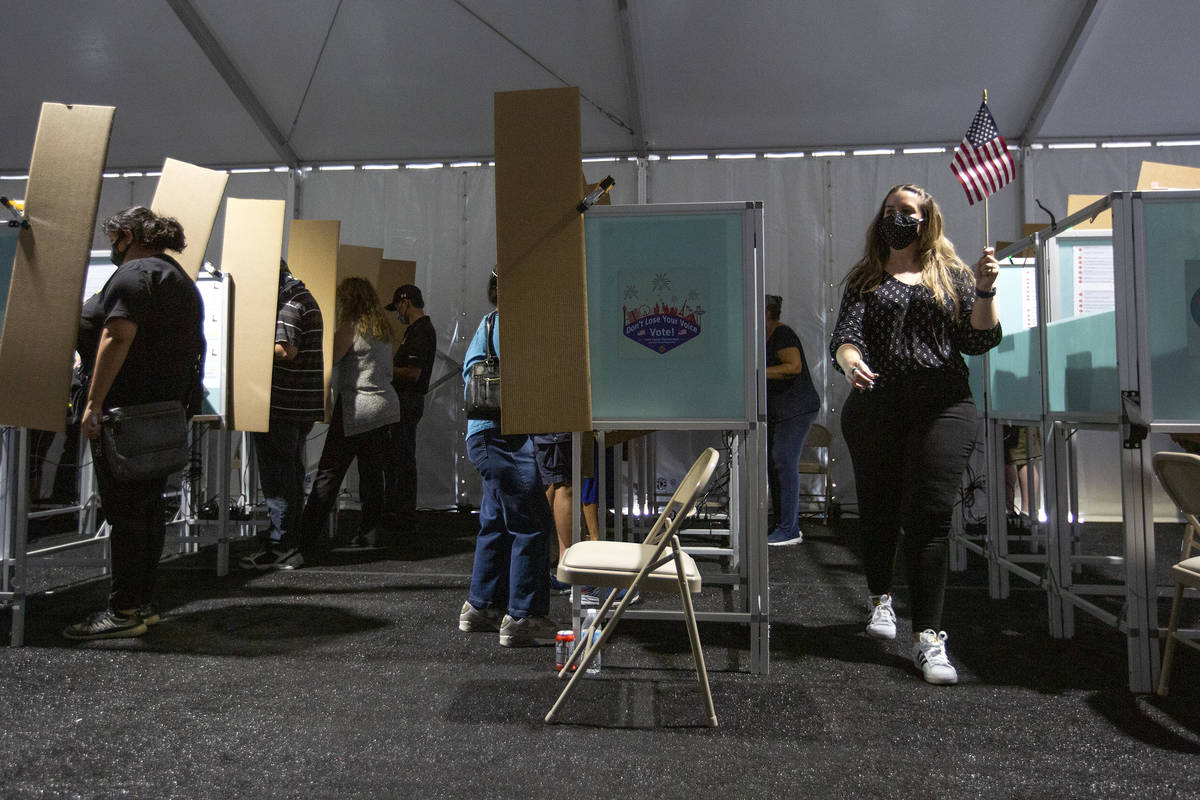 The Boulevard Mall early voting location is full of voters on Oct. 17, 2020, in Las Vegas. (Ell ...
