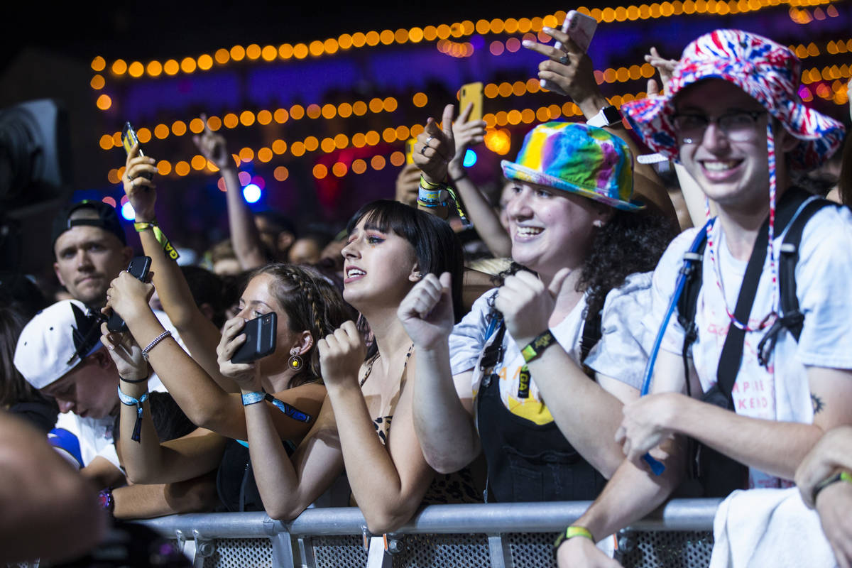 Fans react as Vampire Weekend performs at the downtown stage during day 3 of the Life is Beauti ...