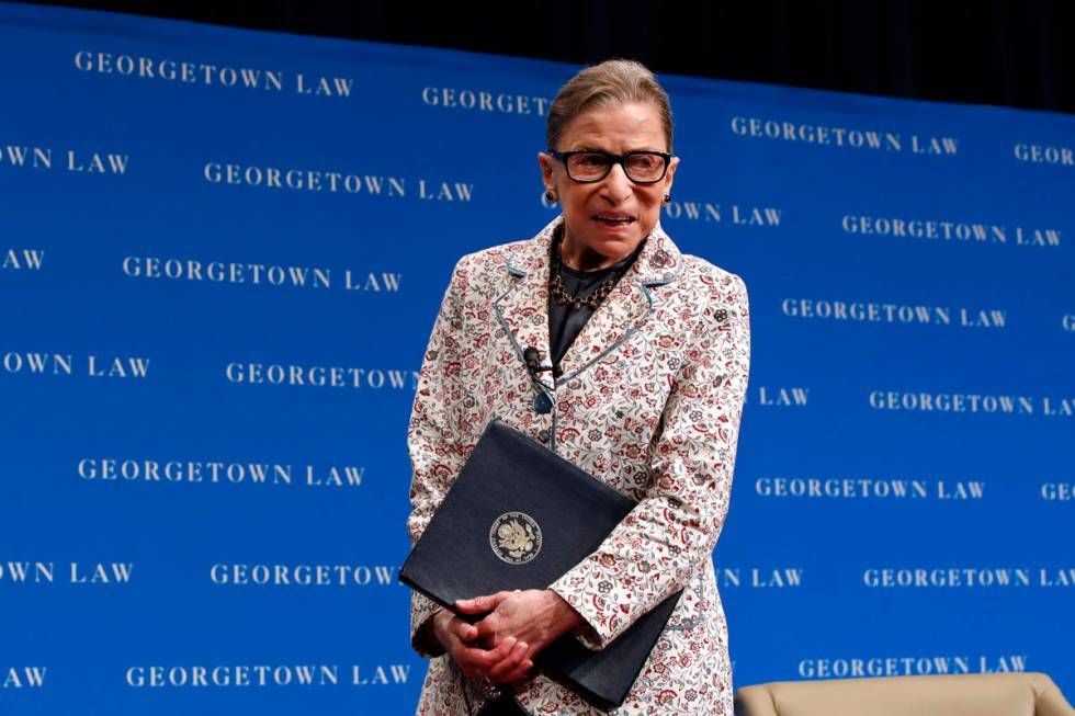 In this Sept. 26, 2018, file photo, Supreme Court Justice Ruth Bader Ginsburg leaves the stage ...