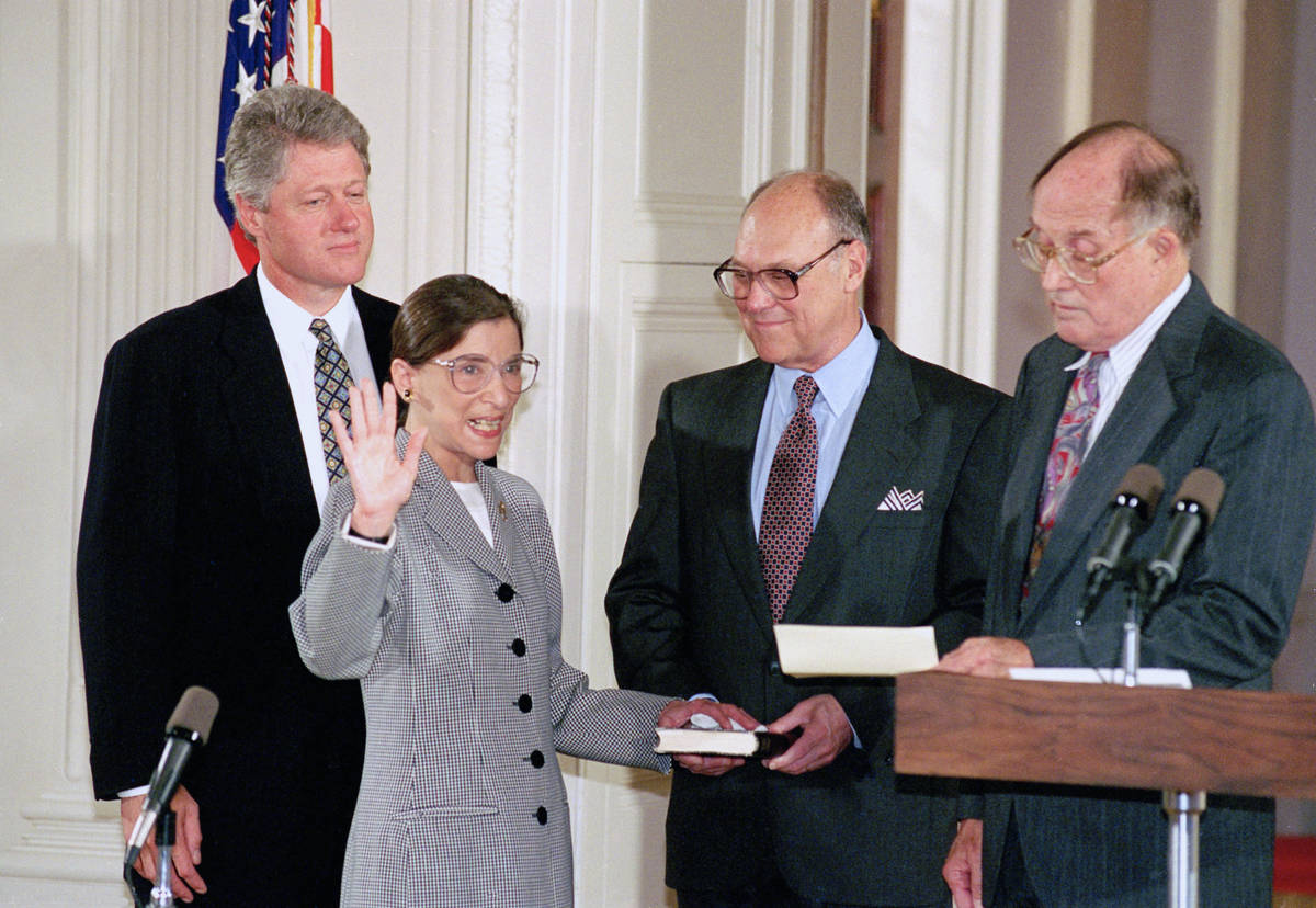 In this Aug. 10, 1993, file photo, Supreme Court Justice Ruth Bader Ginsburg takes the court oa ...