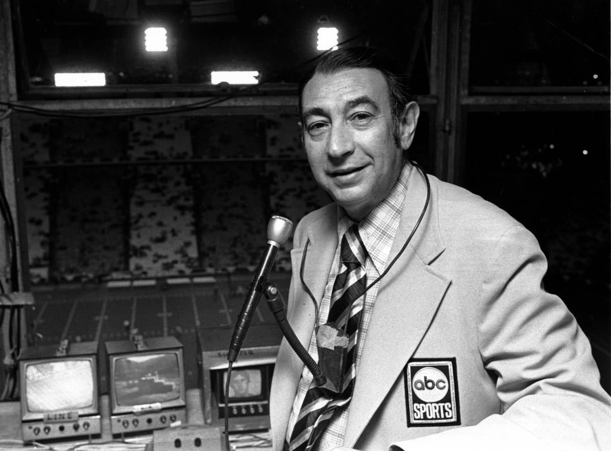 Television sports reporter Howard Cosell poses in the broadcast booth shortly before the Dallas ...