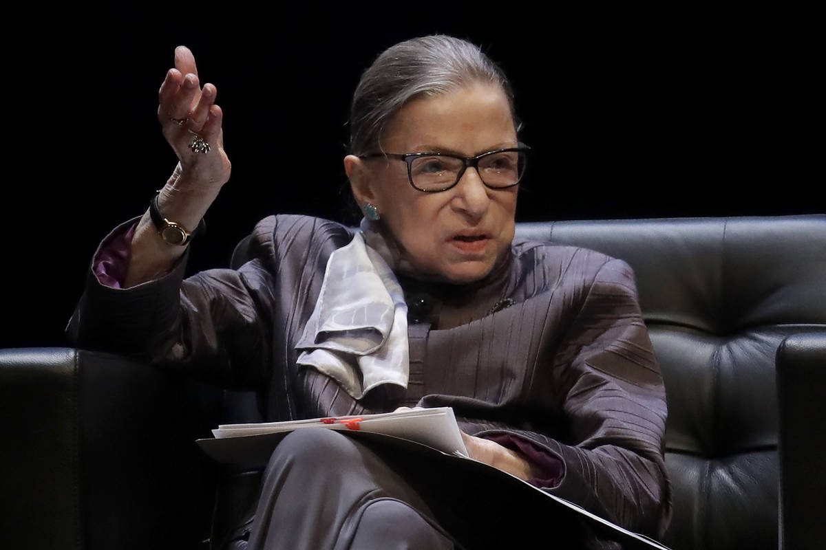 U.S. Supreme Court Justice Ruth Bader Ginsburg gestures while speaking during the inaugural Her ...
