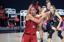 Las Vegas Aces forward Dearica Hamby (5) controls the ball during the first half of a WNBA bask ...
