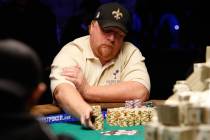 Darvin Moon moves in a stack of chips during the 2009 World Series of Poker at Rio hotel-casino ...