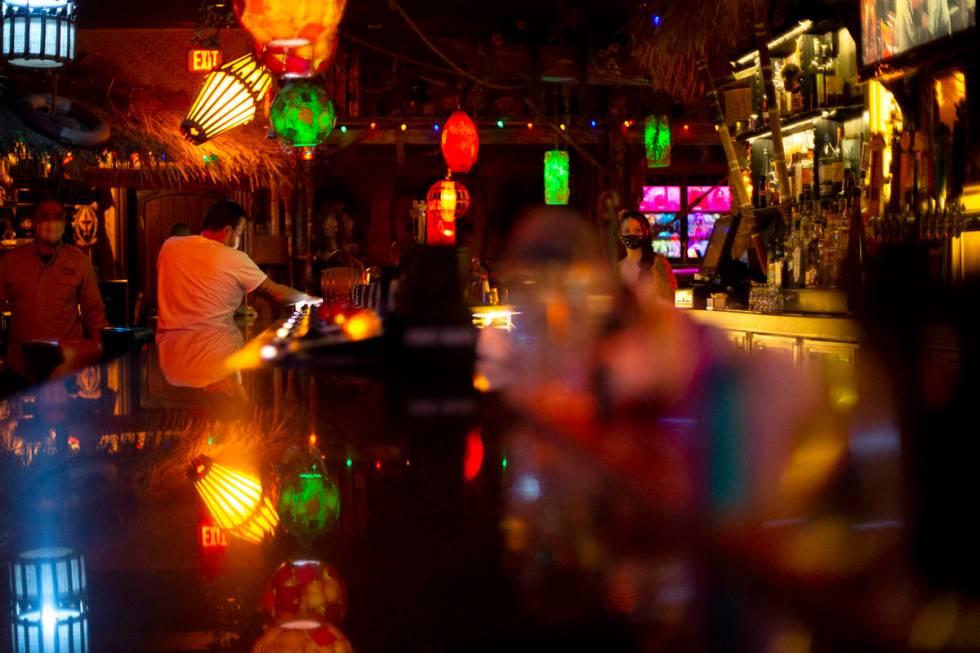 The Golden Tiki's video poker spots at the bar are empty on the first night that bars were allo ...