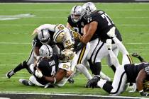 New Orleans Saints defensive tackle David Onyemata (93) sacks Las Vegas Raiders quarterback Der ...