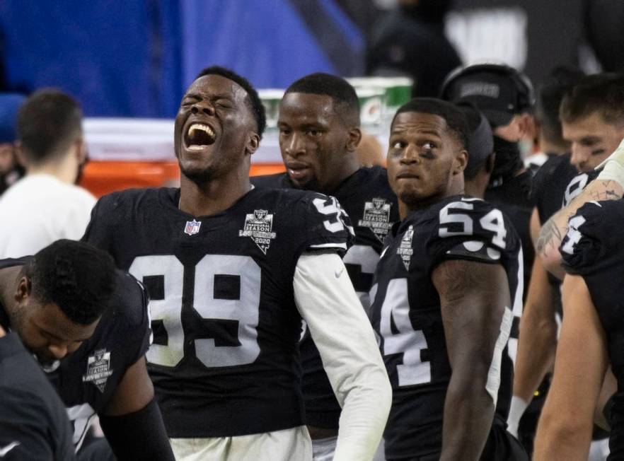 Las Vegas Raiders defensive end Arden Key (99) celebrates after making a big defensive stop in ...