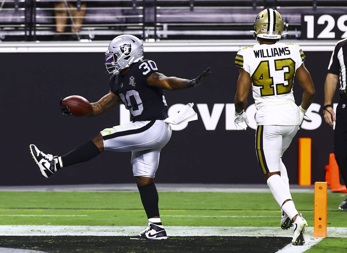 Las Vegas Raiders running back Jalen Richard (30) scores a touchdown past New Orleans Saints fr ...
