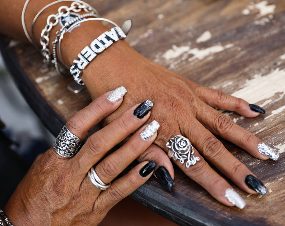Rosemary Gonzales shows off her nails and jewelry at PKWY Tavern ahead of the Raiders first hom ...