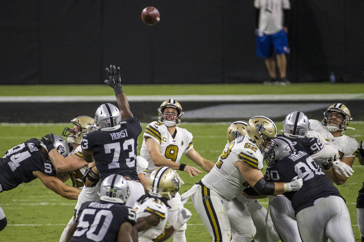 New Orleans Saints quarterback Drew Brees (9) looks as his pass sails deep versus the Las Vegas ...