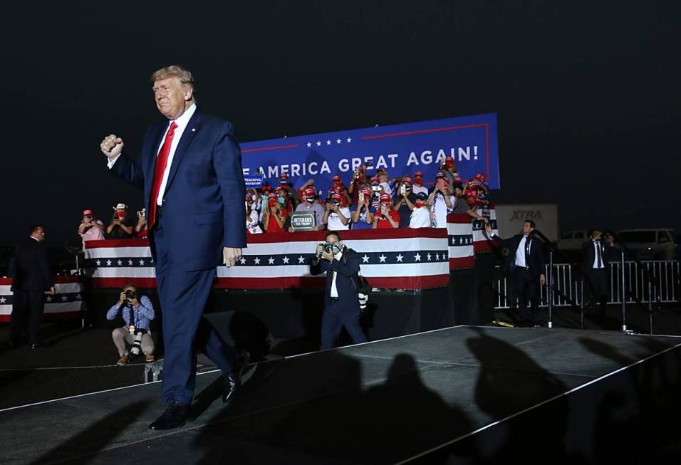 President Donald Trump holds a campaign rally at the Minden-Tahoe Airport in Nevada on Saturday ...