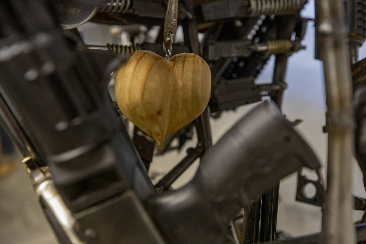 A wooden heart is seen in the chest of David Fay's sculpture commissioned by Indecline titled ' ...