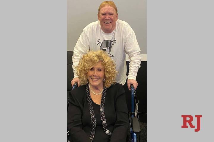 Mark Davis is shown with his mother, Carol, at Davis' Las Vegas Raiders opening watch party at ...