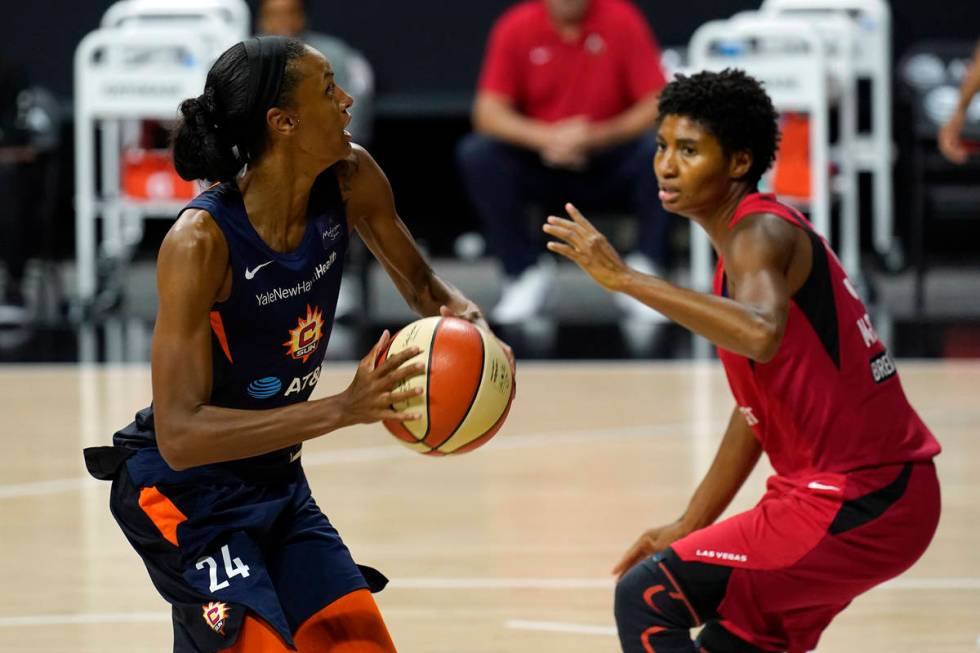 Connecticut Sun forward DeWanna Bonner (24) shoots against Las Vegas Aces forward Angel McCough ...