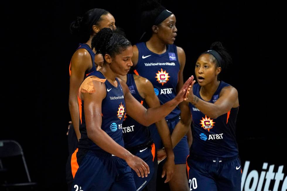 Connecticut Sun forward Alyssa Thomas (25) celebrates a basket against the Las Vegas Aces with ...