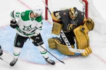 Vegas Golden Knights goalie Marc-Andre Fleury (29) makes a save on Dallas Stars' Alexander Radu ...