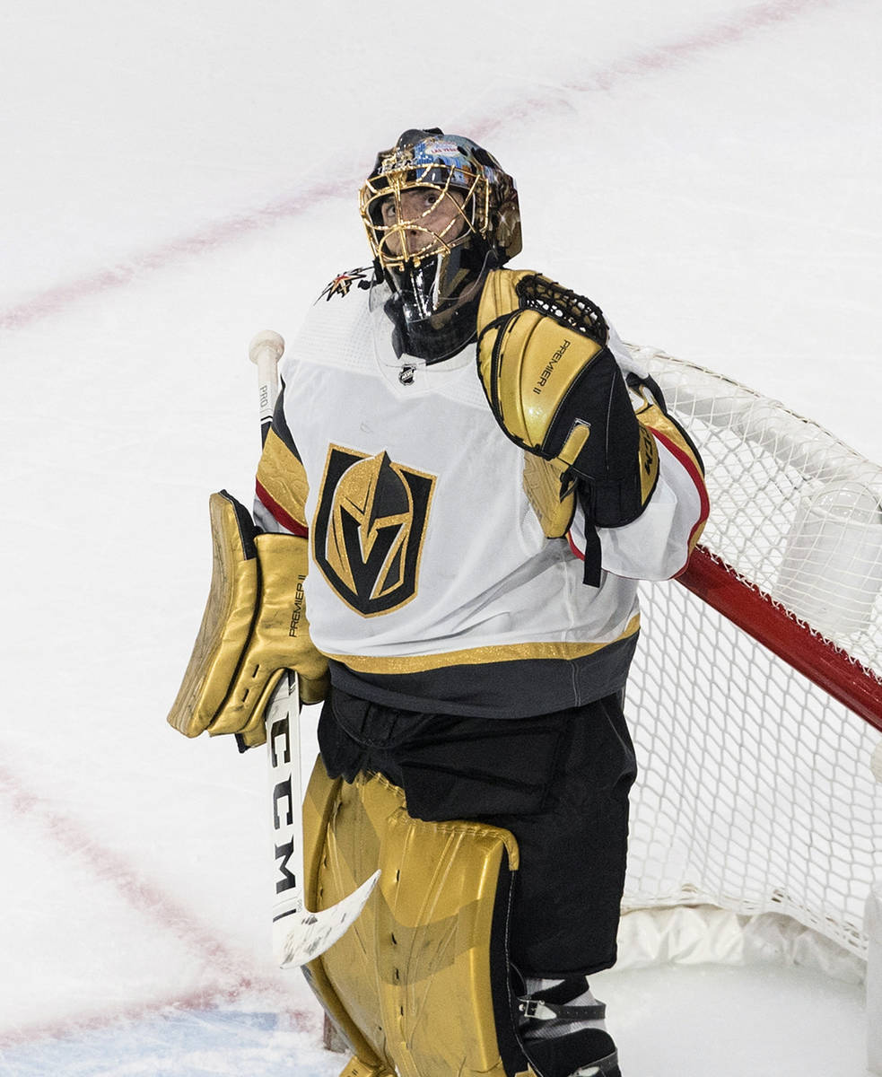 Vegas Golden Knights goalie Marc-Andre Fleury (29) reacts to the win over the Chicago Blackhawk ...