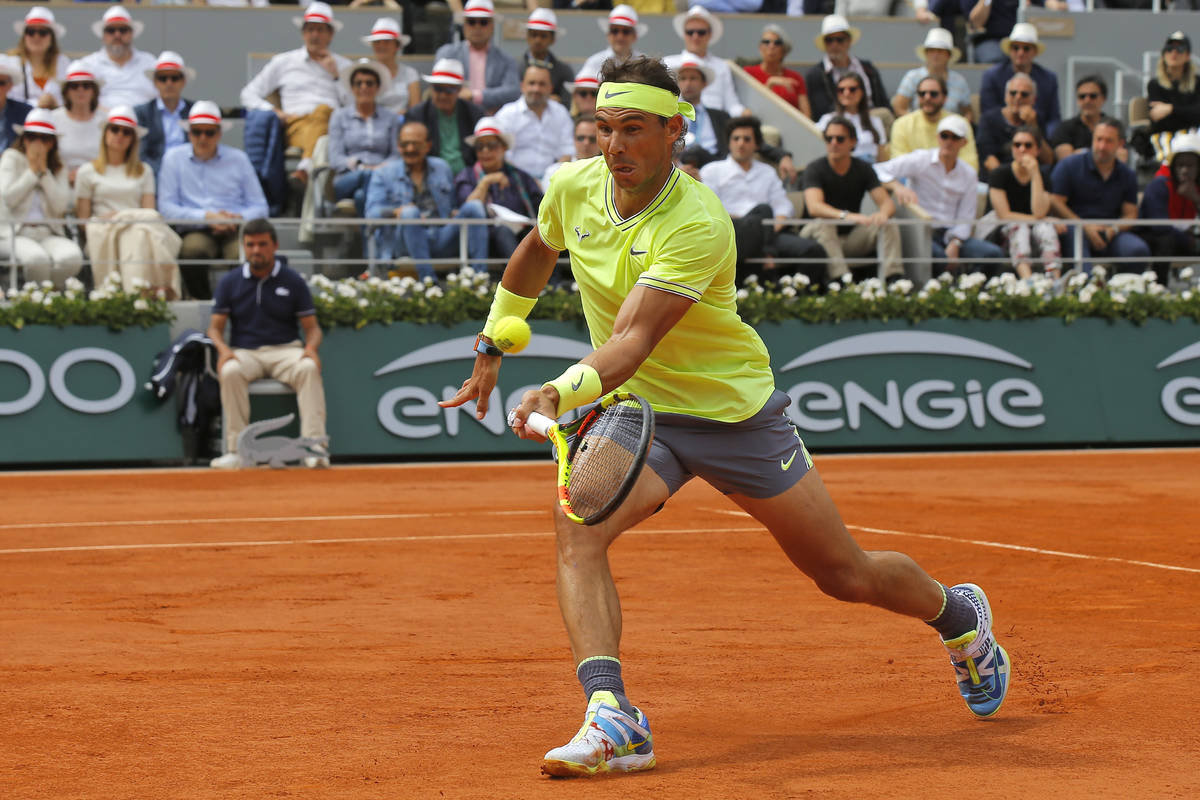 Spain's Rafael Nadal plays a shot against Austria's Dominic Thiem during the men's final match ...