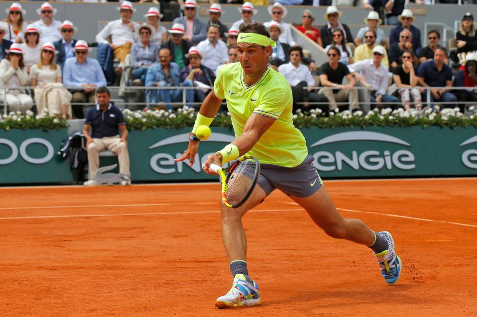 Spain's Rafael Nadal plays a shot against Austria's Dominic Thiem during the men's final match ...