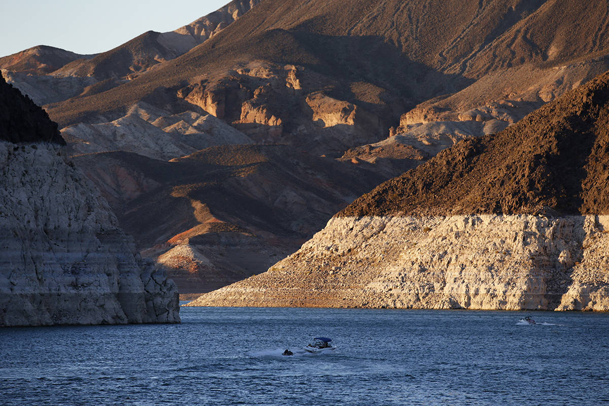 In this July 20, 2014 file photo, a bathtub ring of light minerals shows the high water line ne ...