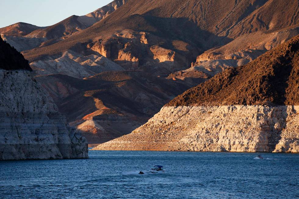 In this July 20, 2014 file photo, a bathtub ring of light minerals shows the high water line ne ...