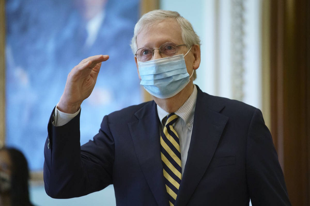 Senate Majority Leader Mitch McConnell, R-Ky., departs the chamber after speaking about the dea ...