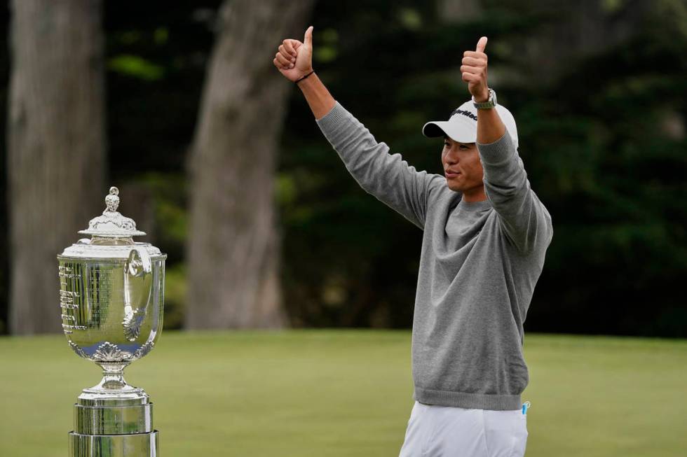 Collin Morikawa poses with the Wanamaker Trophy after winning the PGA Championship golf tournam ...