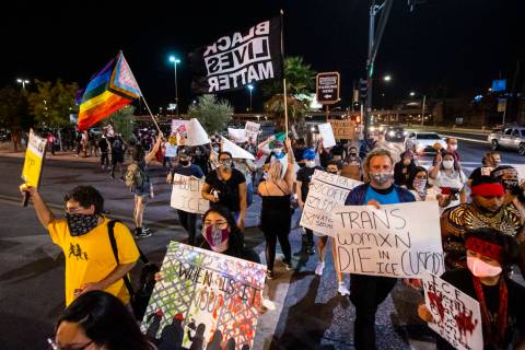 People march during a protest against U.S. Immigration and Customs Enforcement (ICE) in downtow ...