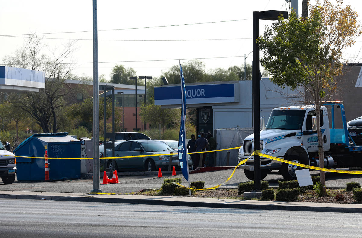 The scene of a homicide where a man was fatally shot Sunday morning at a car wash in North Las ...