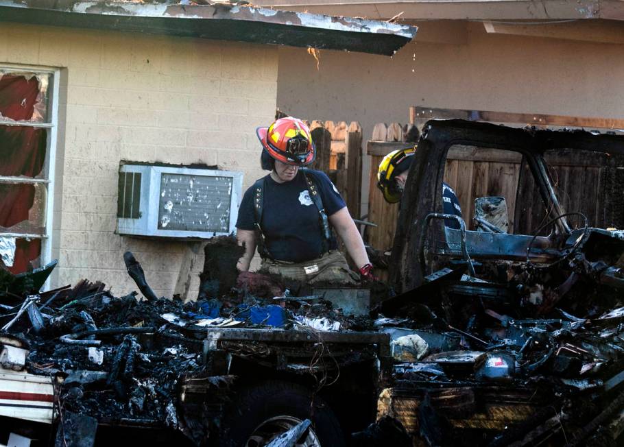 A fire in a recreation vehicle damaged two homes and another vehicle near West Decatur Boulevar ...