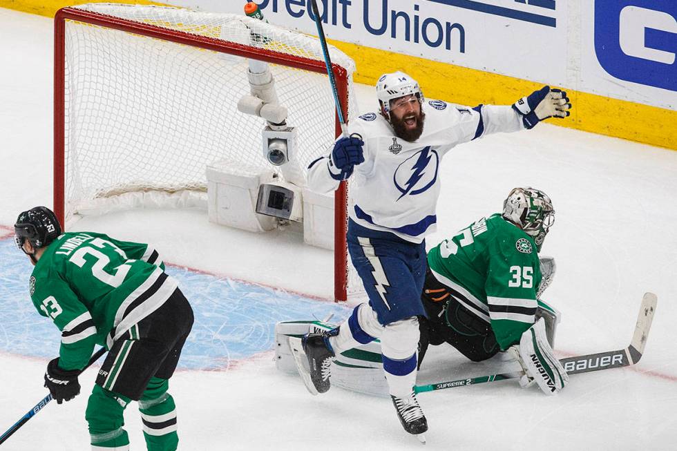Tampa Bay Lightning's Pat Maroon (14) reacts as the puck goes in past Dallas Stars' goalie Anto ...