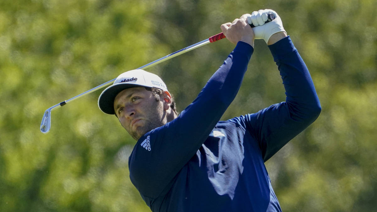 Jon Rahm, of Spain, plays his shot from the third tee during the third round of the US Open Gol ...