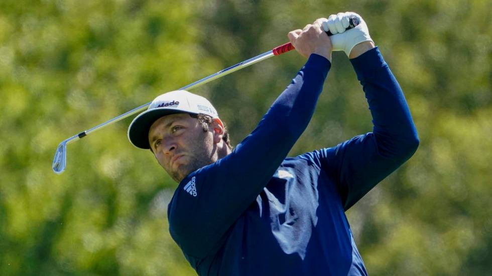 Jon Rahm, of Spain, plays his shot from the third tee during the third round of the US Open Gol ...