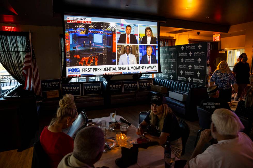 Supporters of President Donald Trump gather before the start of a debate watch party at Rhythm ...