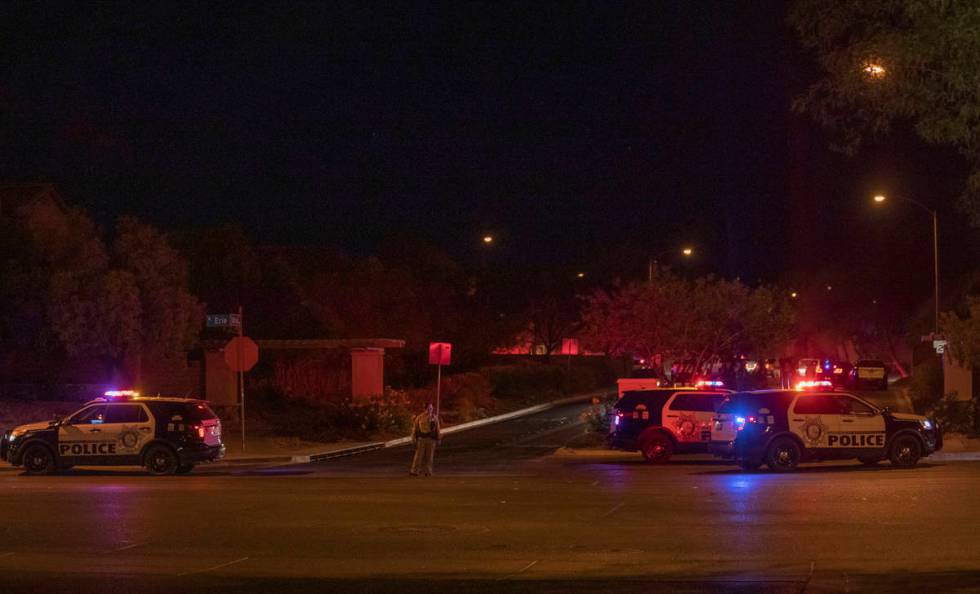 Las Vegas police are seen blocking West Erie Ave. and South Cochiti Lake St in Las Vegas, on Tu ...