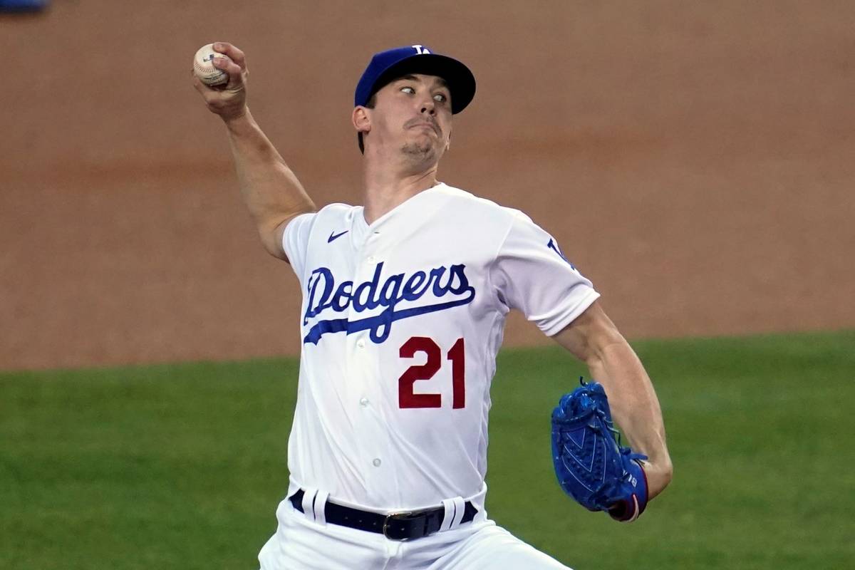 Los Angeles Dodgers starter Walker Buehler throws to an Oakland Athletics batter during the fir ...