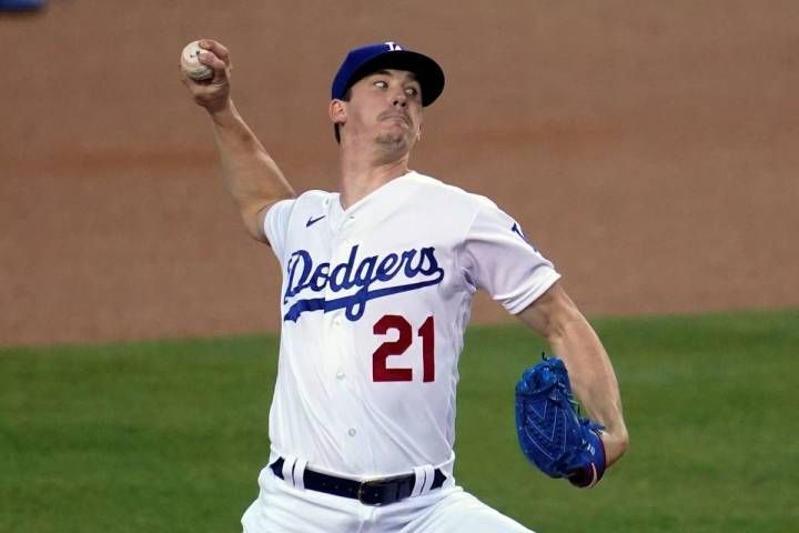 Los Angeles Dodgers starter Walker Buehler throws to an Oakland Athletics batter during the fir ...