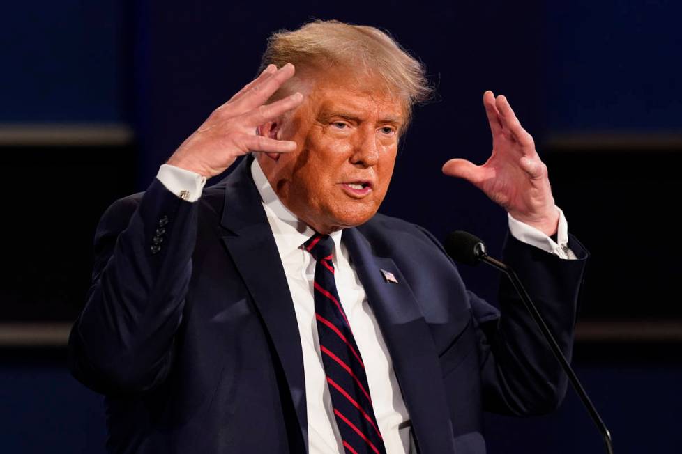 President Donald Trump gestures while speaking during the first presidential debate Tuesday, Se ...