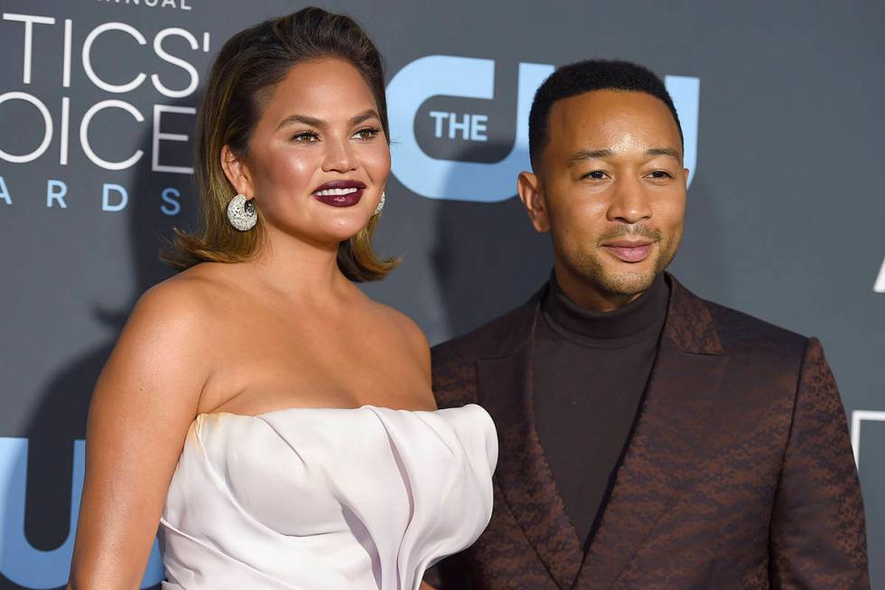 Chrissy Teigen, left, and John Legend arrive at the 24th annual Critics' Choice Awards on Jan. ...